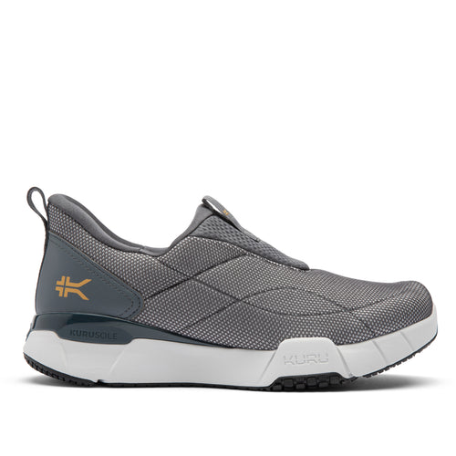 Gray athletic shoe with white sole on a white background