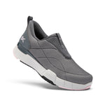 Gray slip-on shoe with pink sole on a white background