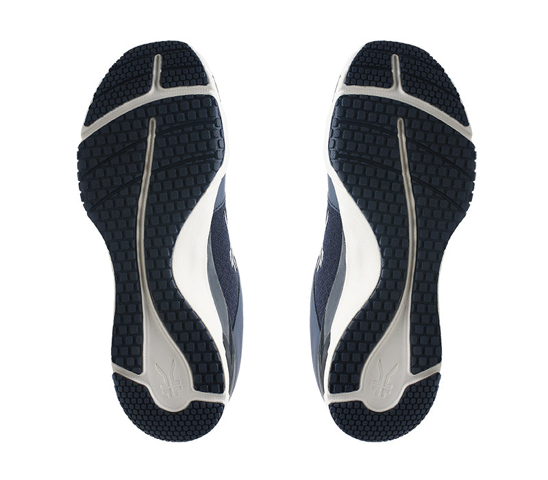 Detail of the sole pattern on the KURU Footwear QUANTUM Men's Fitness Sneaker in MidnightBlue-White-JetBlack