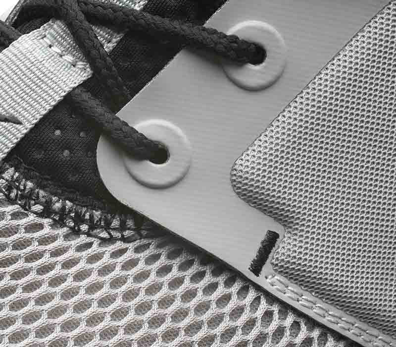 Close-up of the material on the KURU Footwear ATOM Men's Athletic Sneaker in CloudGray-White-JetBlack