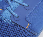 Close-up of the material on the KURU Footwear ATOM Men's Athletic Sneaker in ClassicBlue-White-Marigold