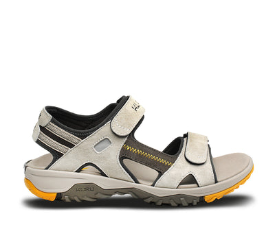 Outside profile details on the KURU Footwear TREAD Men's Sandals in Feather-CedarBrown-Golden