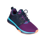 Toe touch view on KURU Footwear ATOM Women's Athletic Sneaker in ElectricGrape-MidnightBlue