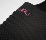 Close-up of the material on the KURU Footwear STRIDE Women's Slip-on Sneaker in JetBlack-White-BerryPink