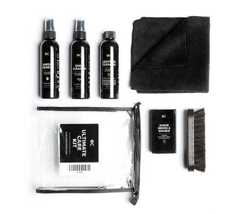 KURU Footwear KURU Ultimate Care Kit, laid out Shoe Cleaner, Suede Renew, Leather Cleaner, Cleaning Brush, Suede Brush & Eraser, and black folded microfiber cloth.